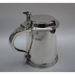 An Elizabeth II silver lidded tankard,