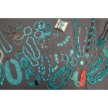 Turquoise beaded necklaces together with turquoise set bracelets,