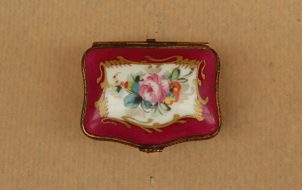 A 19th century porcelain box and cover painted with flowers to the lid and a rose pink border with - Image 3 of 7