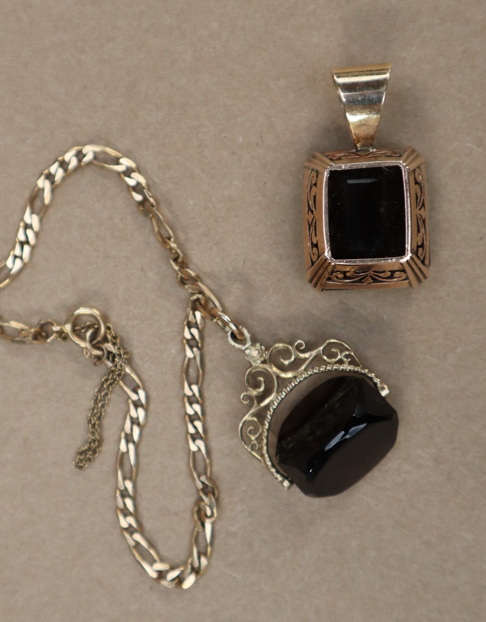 A smokey quartz pendant, set in yellow metal, - Image 5 of 5