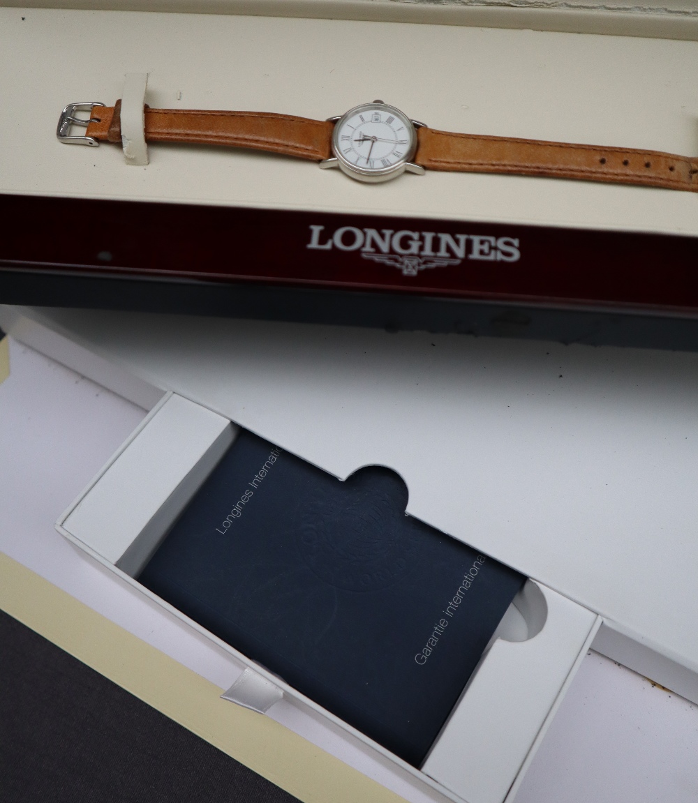 A lady's Stainless Steel Longines wristwatch with a white dial and Roman numerals and a date - Image 8 of 8