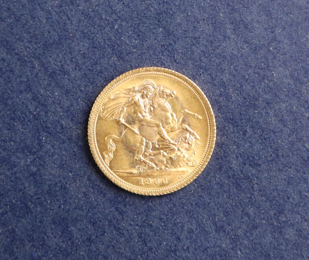An Elizabeth II gold sovereign,