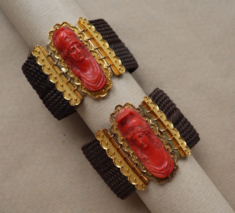 A pair of Victorian yellow metal, carved coral and plaited hair mourning bracelets,