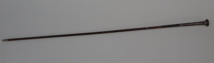 A white metal mounted walking stick, with heart shaped decoration,