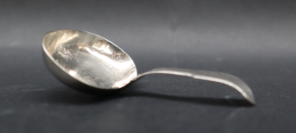 A George III silver fiddle pattern caddy spoon with an oval bowl, London, 1814,