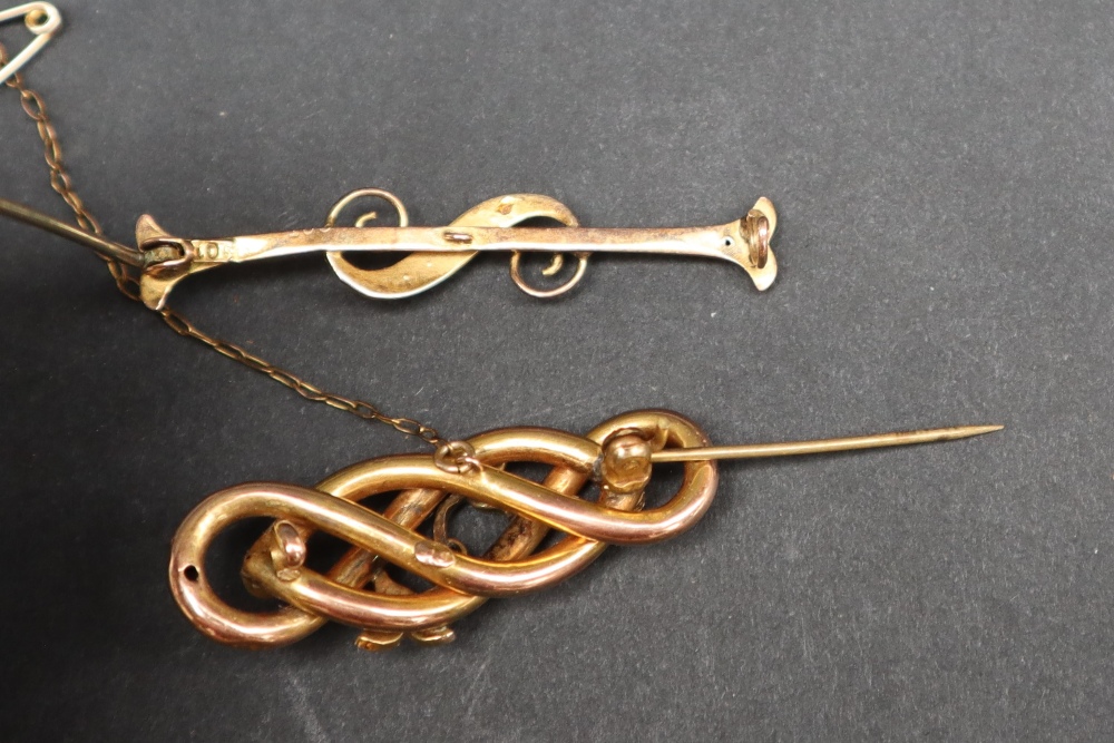 A 9ct yellow gold scrolling bar brooch set with rubies and seed pearls together with another seed - Image 3 of 4