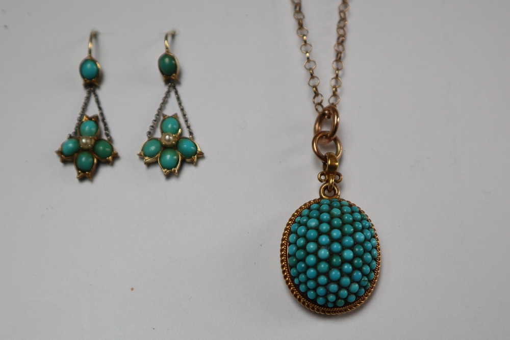 A yellow metal pendant of oval form set with turquoise on a 9ct yellow gold chain, - Image 2 of 5