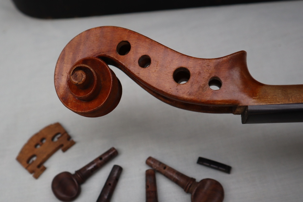 A violin with a two piece back, bears a trade label The Garrodus violin, dated 1897, overall 58. - Image 5 of 14