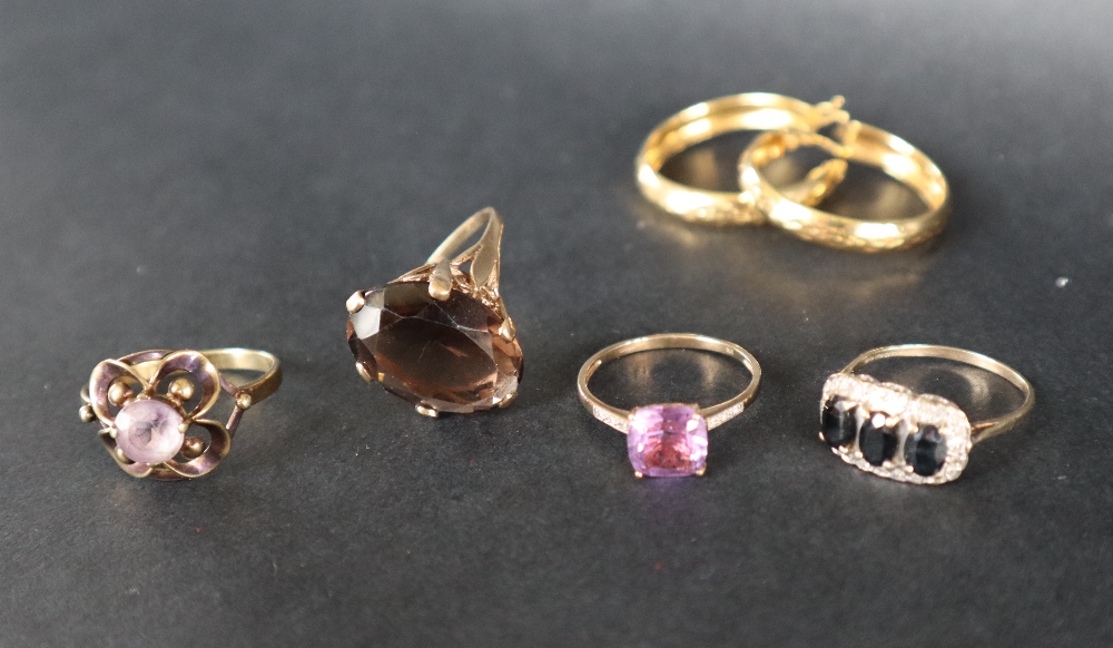 A 9ct yellow gold amethyst set dress ring together with two other 9ct gold rings another ring and - Image 3 of 8
