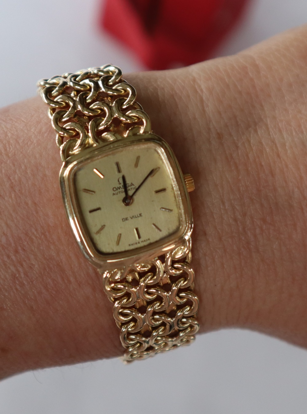 A lady's 18ct gold Omega Automatic De Ville wristwatch with a square dial and batons on an 18ct - Image 8 of 9