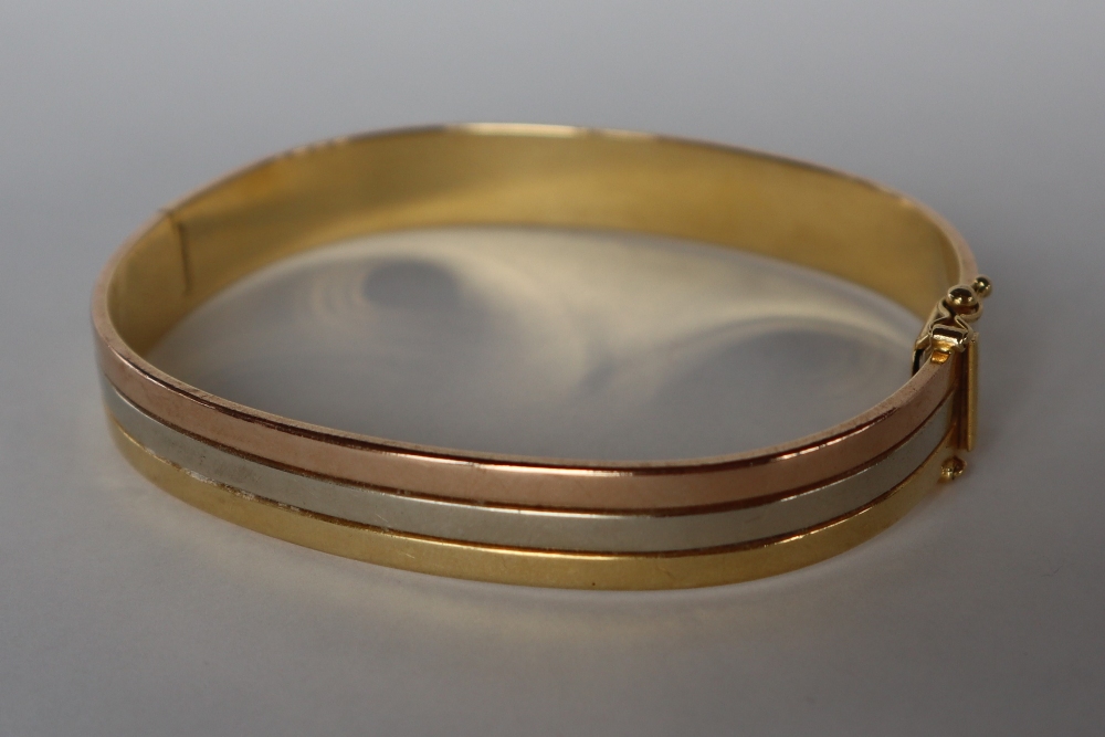 An 18ct three colour banded gold hinged bangle, - Image 4 of 6