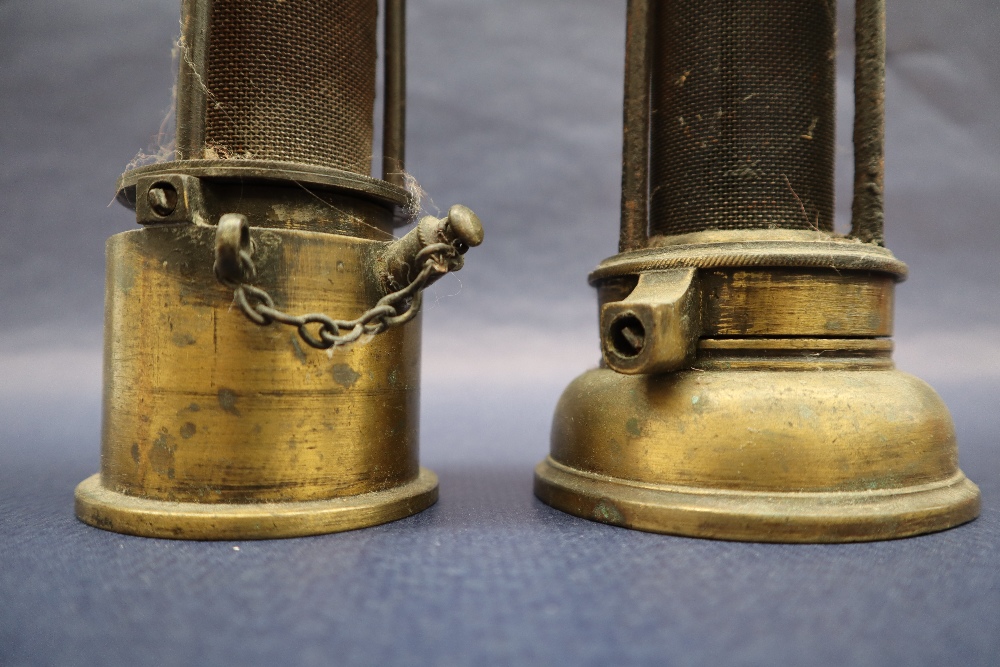 A 19th century brass Davy lamp, with an arched top and gauze shield on a screwed on brass base, 24. - Image 3 of 12