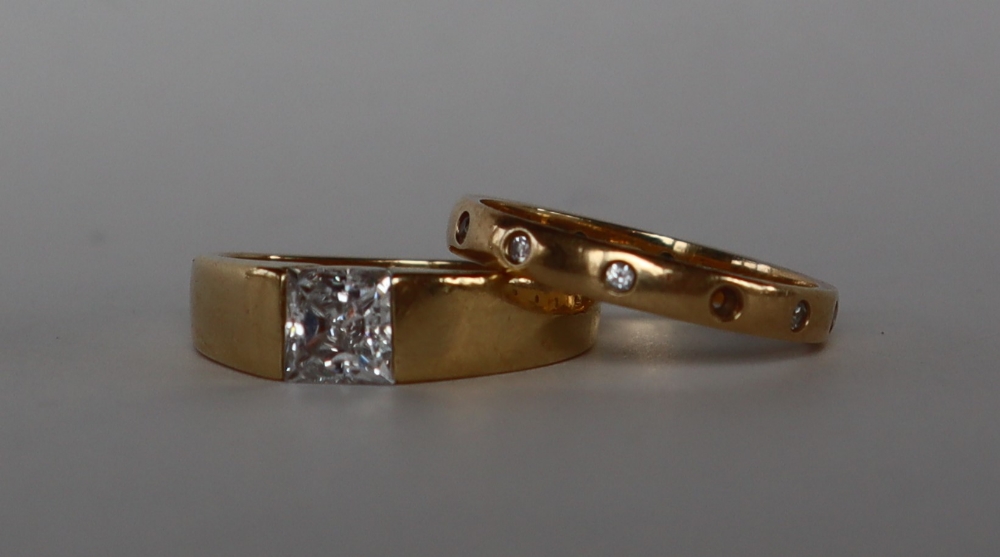 A 14ct gold ring with a princess cut Cubic Zirconium, size L,