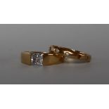 A 14ct gold ring with a princess cut Cubic Zirconium, size L,