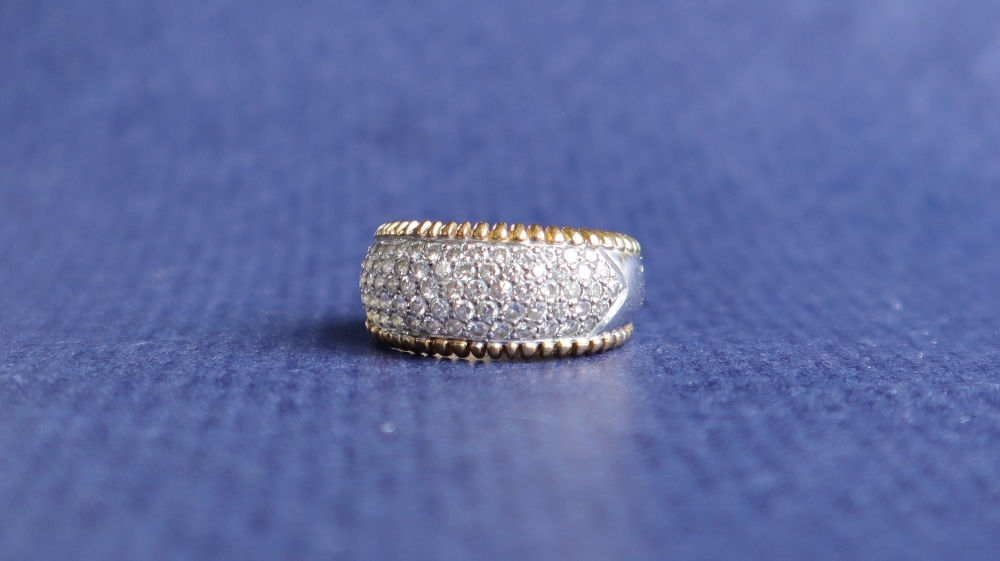 An 18ct yellow and white gold ring, set with a panel of round brilliant cut diamonds, size P, - Image 3 of 8