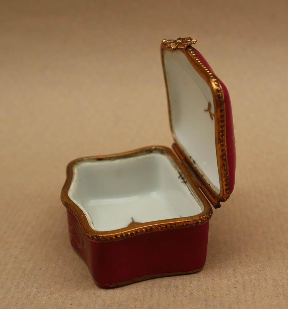 A 19th century porcelain box and cover painted with flowers to the lid and a rose pink border with - Image 6 of 7