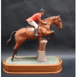 A limited edition Worcester Royal Porcelain company limited equestrian statuette of Foxhunter and