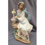 A Lladro Privilege Garden Breeze limited edition figure by Francisco Polope,