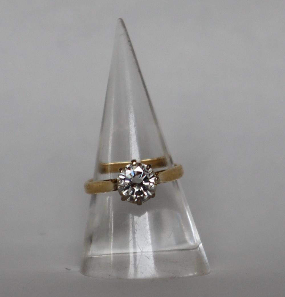 A solitaire diamond ring, the round brilliant cut diamond approximately 1.