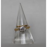 A solitaire diamond ring, the round brilliant cut diamond approximately 1.