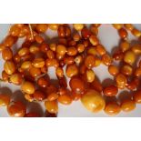 An amber bead necklace with graduated beads,