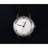 A mid-20th century Omega wristwatch, the silvered dial with Arabic numerals and dot markers,