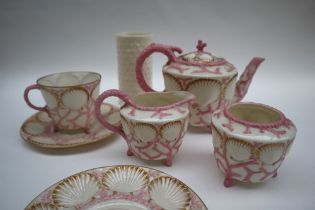 A Victorian Belleek shell and coral bachelor part tea set comprising a tea pot, cream jug,