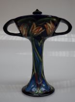 A Moorcroft pottery twin handled bonbonniere and cover in the loch hope pattern,