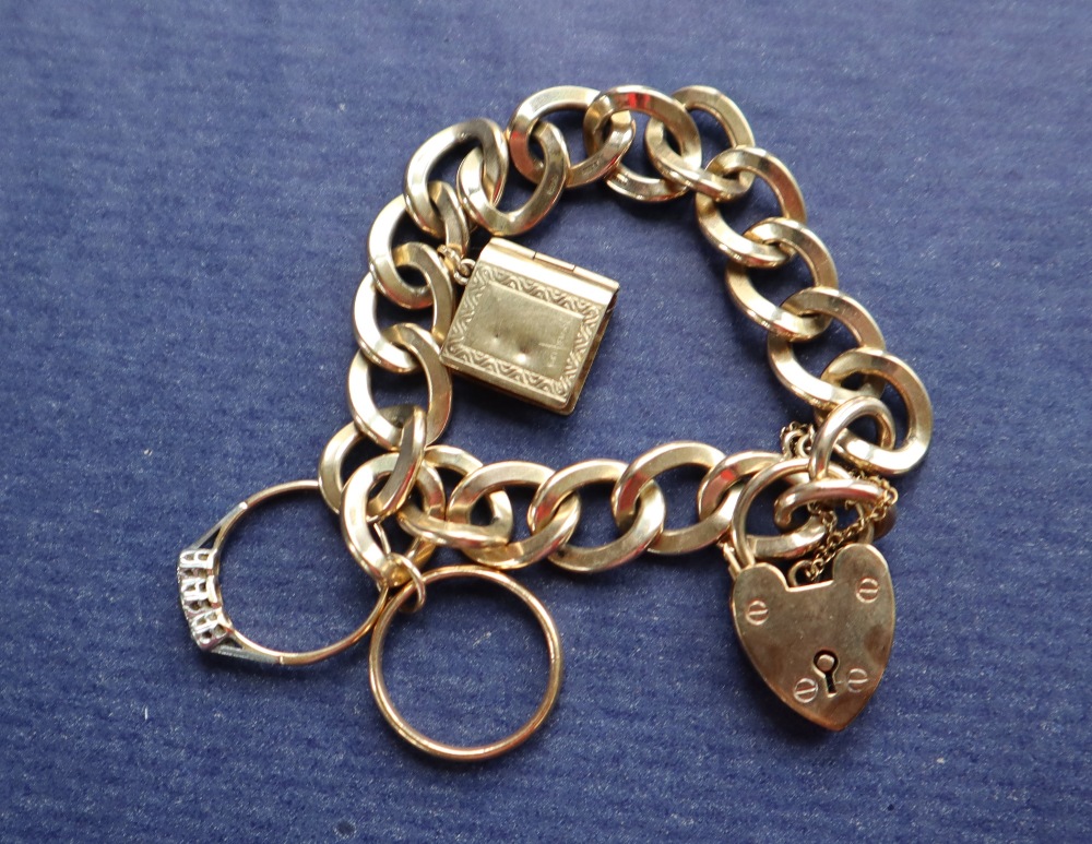 A 9ct yellow gold bracelet with twisted oval links, to a heart shaped padlock clasp, - Image 3 of 3