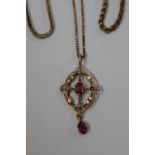 A 9ct gold ruby and seed pearl pendant on a 9ct gold chain together with 9ct gold necklaces,