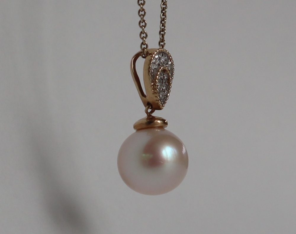 A 9ct yellow gold cultured pearl and diamond inverted pear-shape pendant and chain, - Image 5 of 6