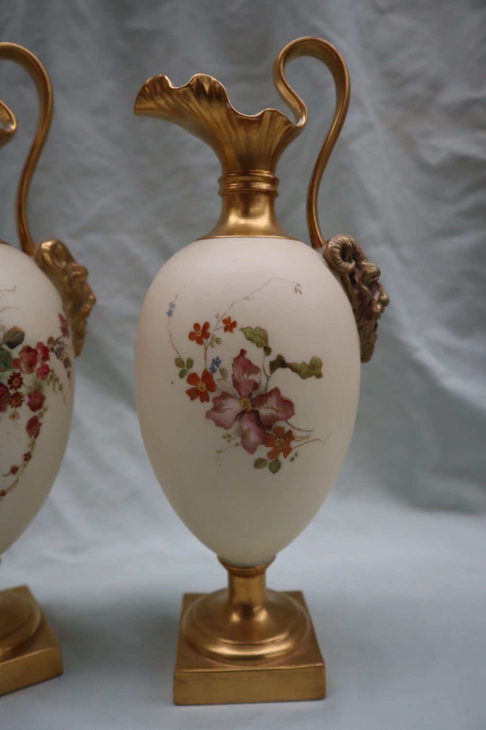 A pair of Royal Worcester porcelain ewers with wavy spout, mask terminal handles, - Image 8 of 10