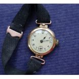 A lady's 18ct gold wristwatch with a silvered dial,