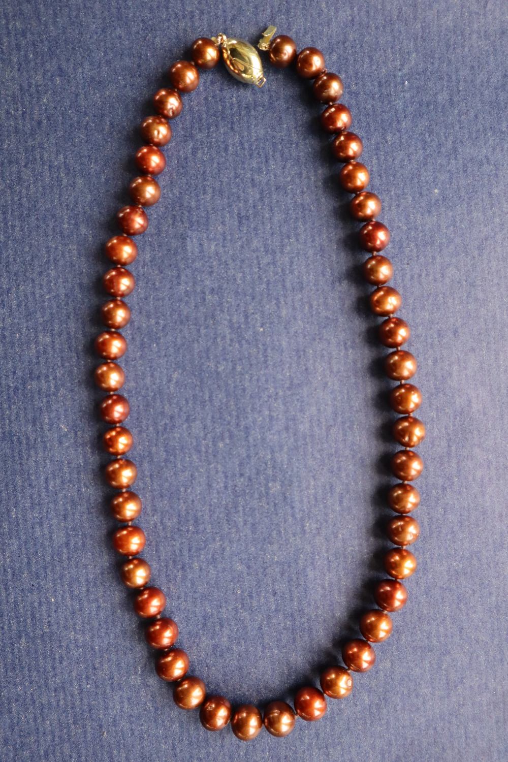 A string of cocoa freshwater cultured pearls, with a 9ct yellow gold "coffee bean" clasp, - Image 3 of 3