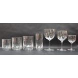 A suite of Baccarat crystal drinking glasses including twelve red wine glasses,