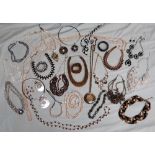 Faux pearls together with costume jewellery necklaces etc