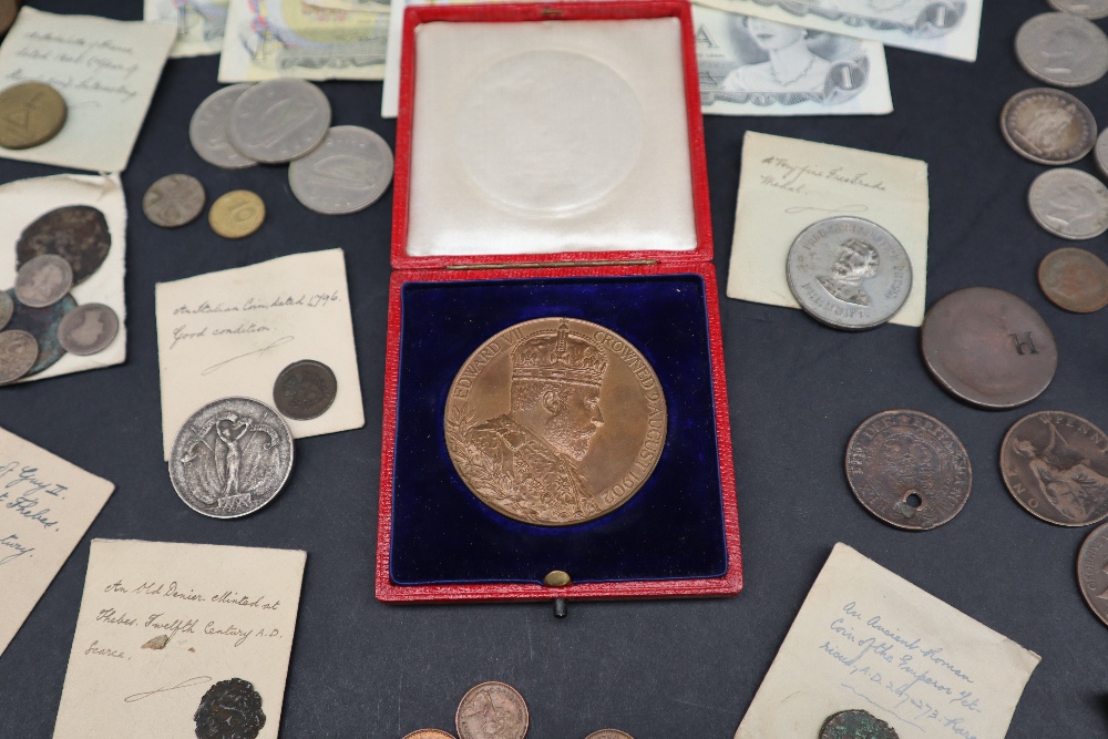 An Edward VII 1902 Coronation medal, cased together with a Festival of Britain Crown, other crowns,