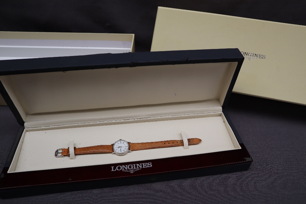 A lady's Stainless Steel Longines wristwatch with a white dial and Roman numerals and a date - Image 2 of 8