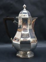 An Edward VII silver baluster hot water pot, London, 1908,