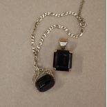 A smokey quartz pendant, set in yellow metal,