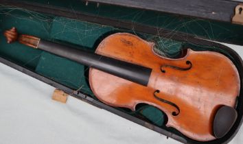 A violin with a two piece back, bears a trade label The Garrodus violin, dated 1897, overall 58.