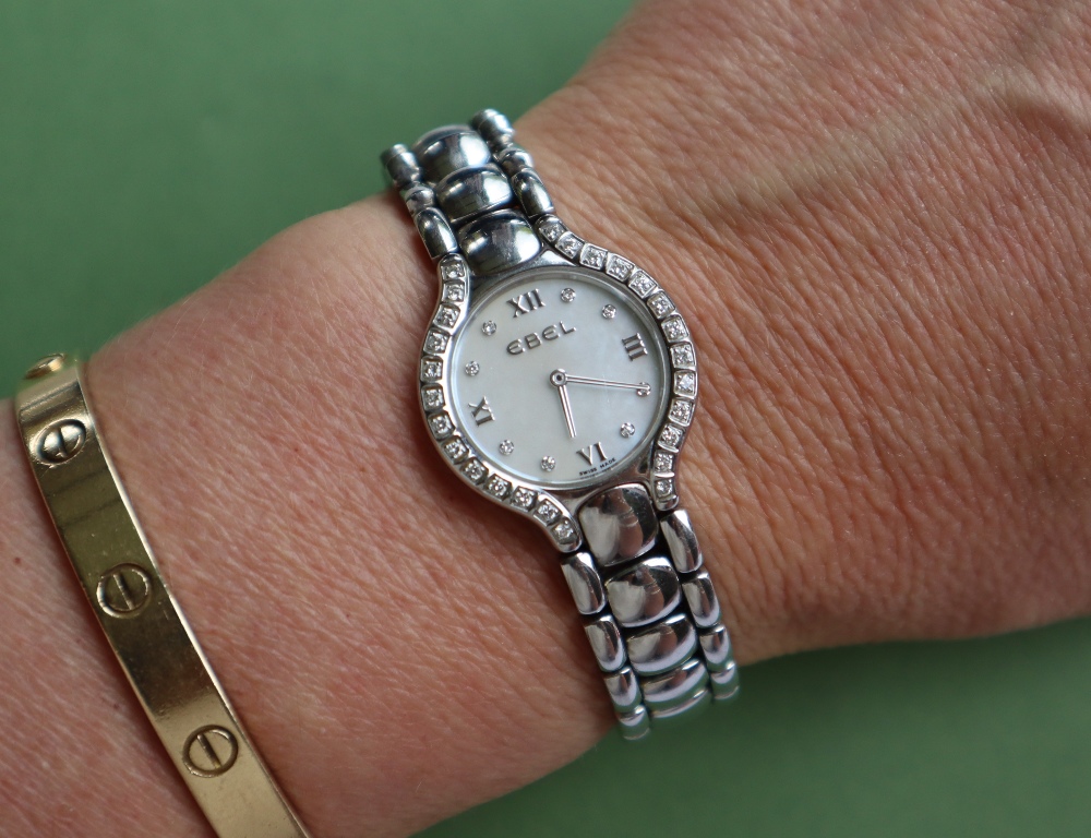 A ladies stainless steel lady's Ebel beluga wristwatch with a mother of pearl dial with Roman