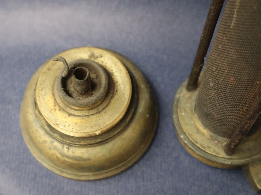 A 19th century brass Davy lamp, with an arched top and gauze shield on a screwed on brass base, 24. - Image 8 of 12