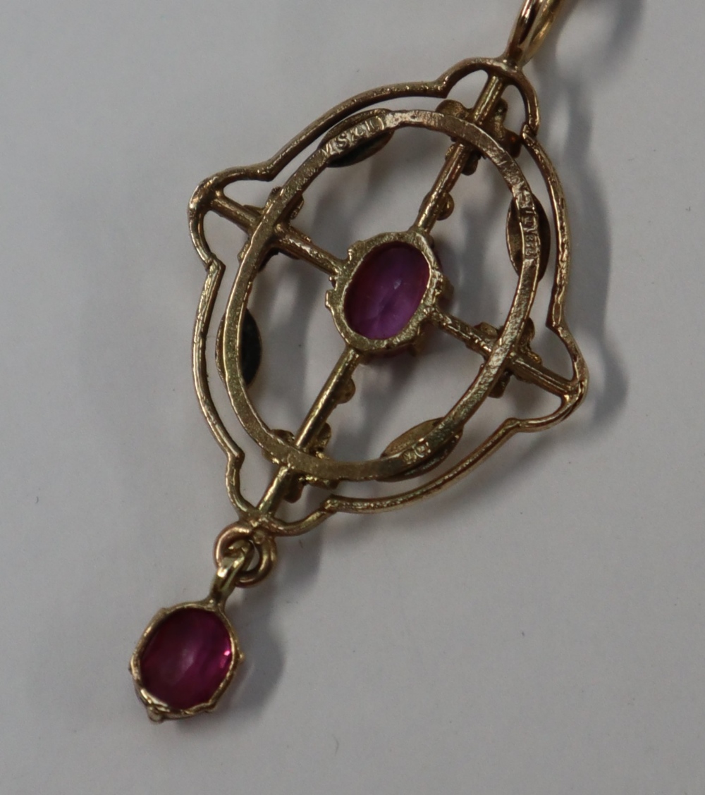 A 9ct gold ruby and seed pearl pendant on a 9ct gold chain together with 9ct gold necklaces, - Image 3 of 4
