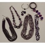 Amethyst set necklaces together with amethyst coloured bracelets etc