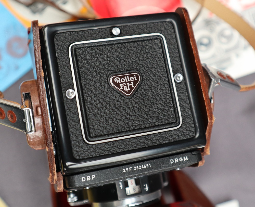A Rolleiflex camera together with a Werra Matic camera and paperwork CONDITION REPORT: - Image 4 of 16