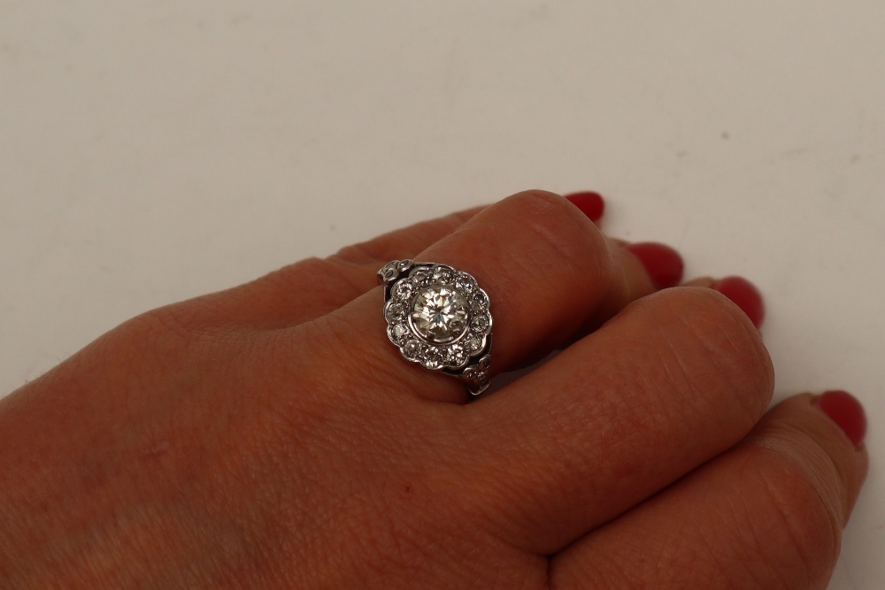 A diamond cluster ring, the central round old cut diamond, approximately 0. - Image 7 of 7