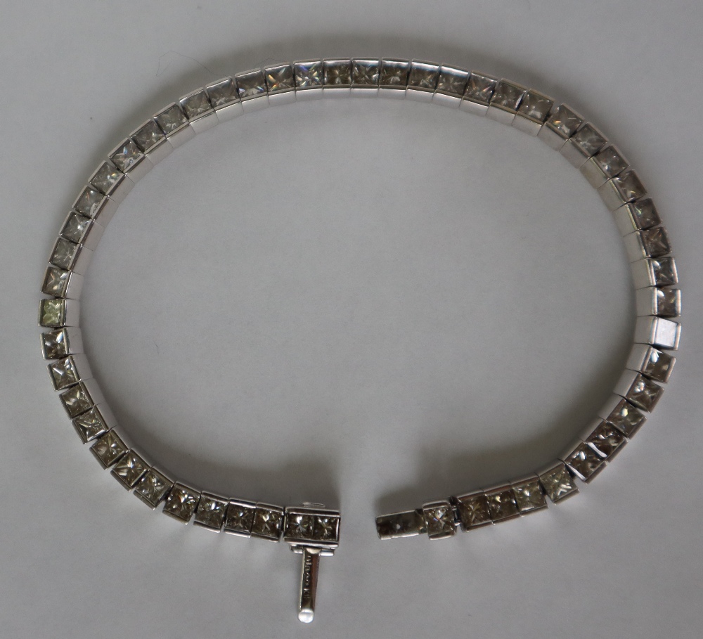 An 18ct white gold diamond set tennis bracelet, - Image 4 of 10