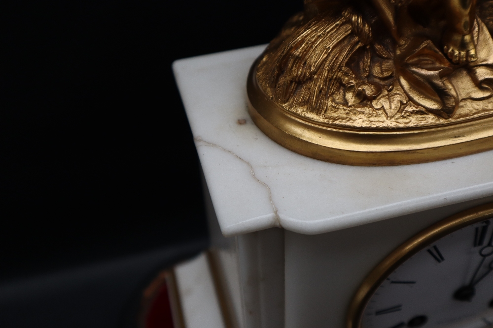 A 19th century white marble clock with a gilt metal surmount of a boy feeding chicken whilst seated - Image 10 of 11