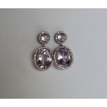 A pair of amethyst and diamond drop earrings,